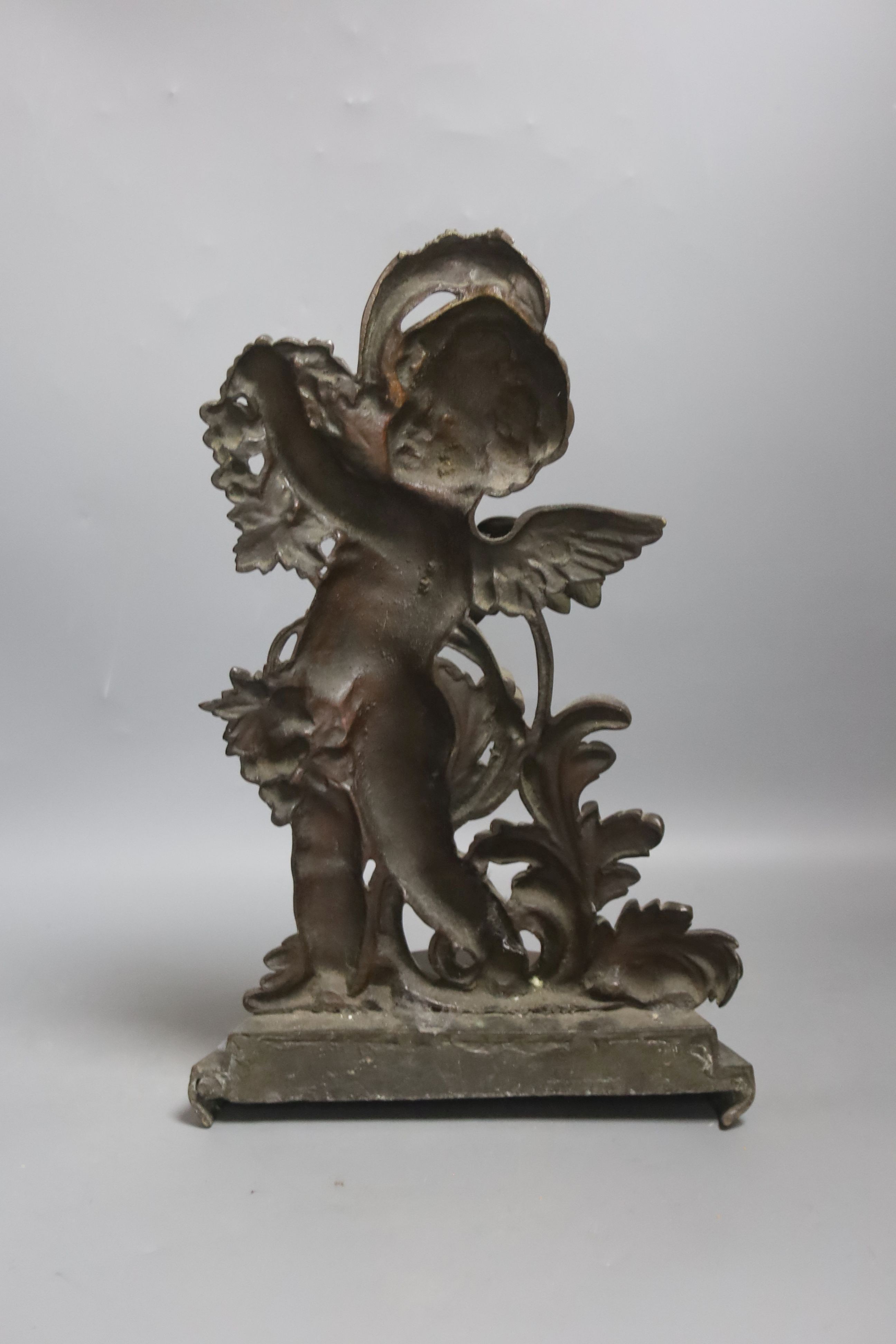 A 19th century bronze putti door stop, 33cm
